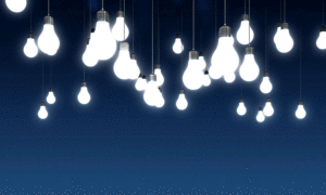White lit lightbulbs hanging on strings