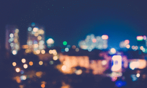 Unfocused image of a city’s skyline at night